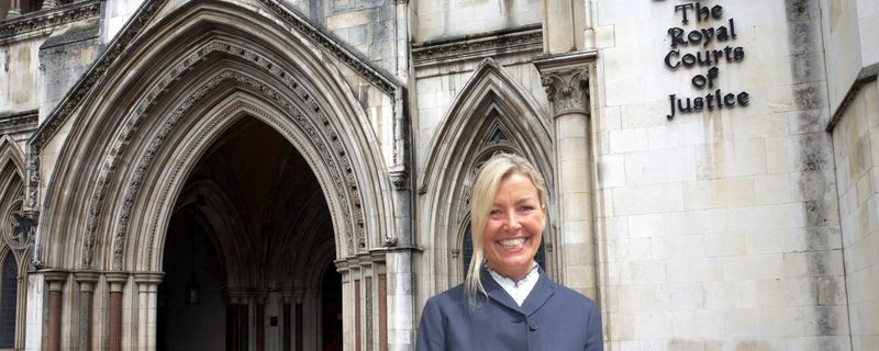 Lindsey Goldrick-Dean outside the Royal Courts of Justice after her harassment case